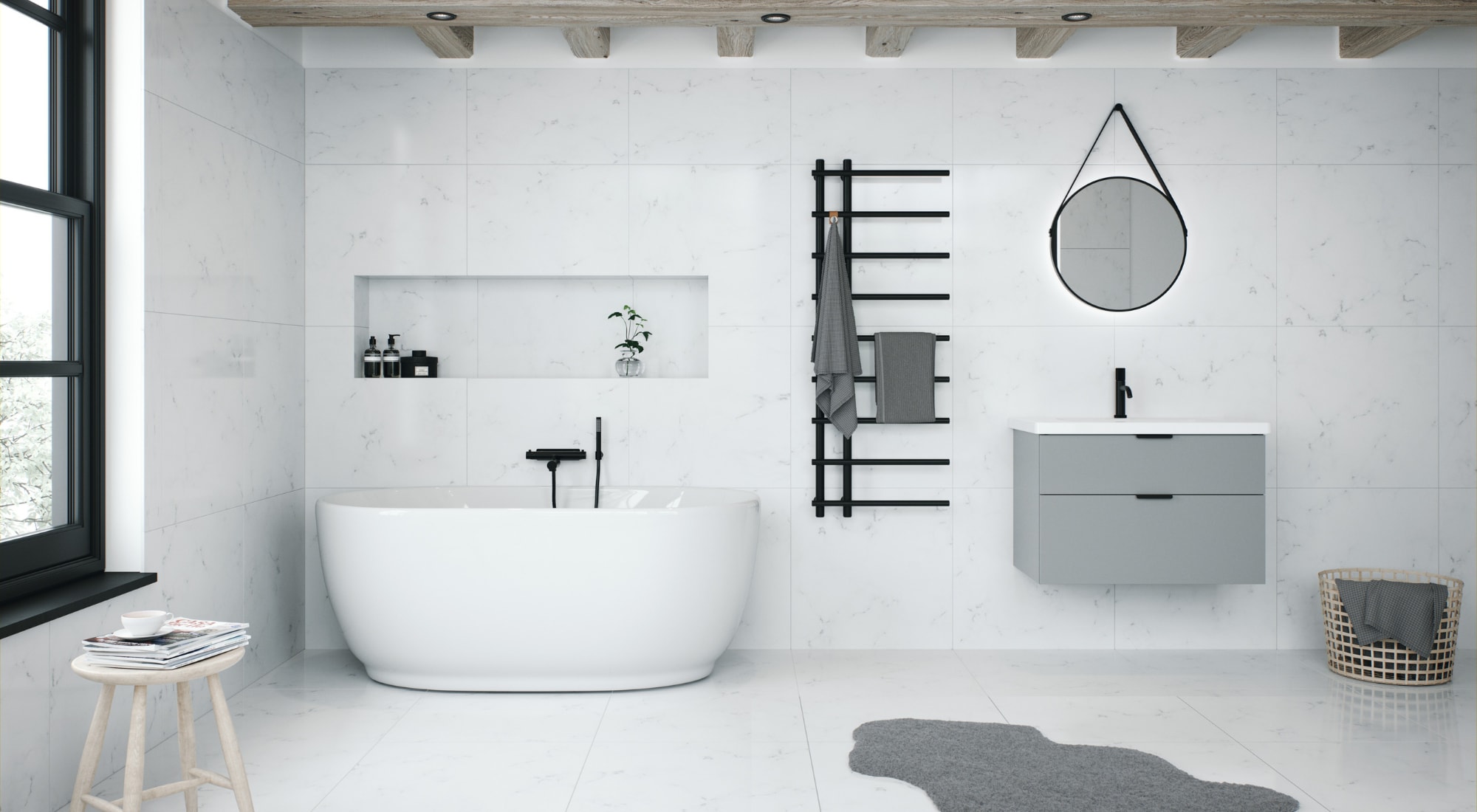 vitt marmor kakel badrum med fristående badkar, grå badrumskommod, rund badrumsspegel och mattsvart handdukstork